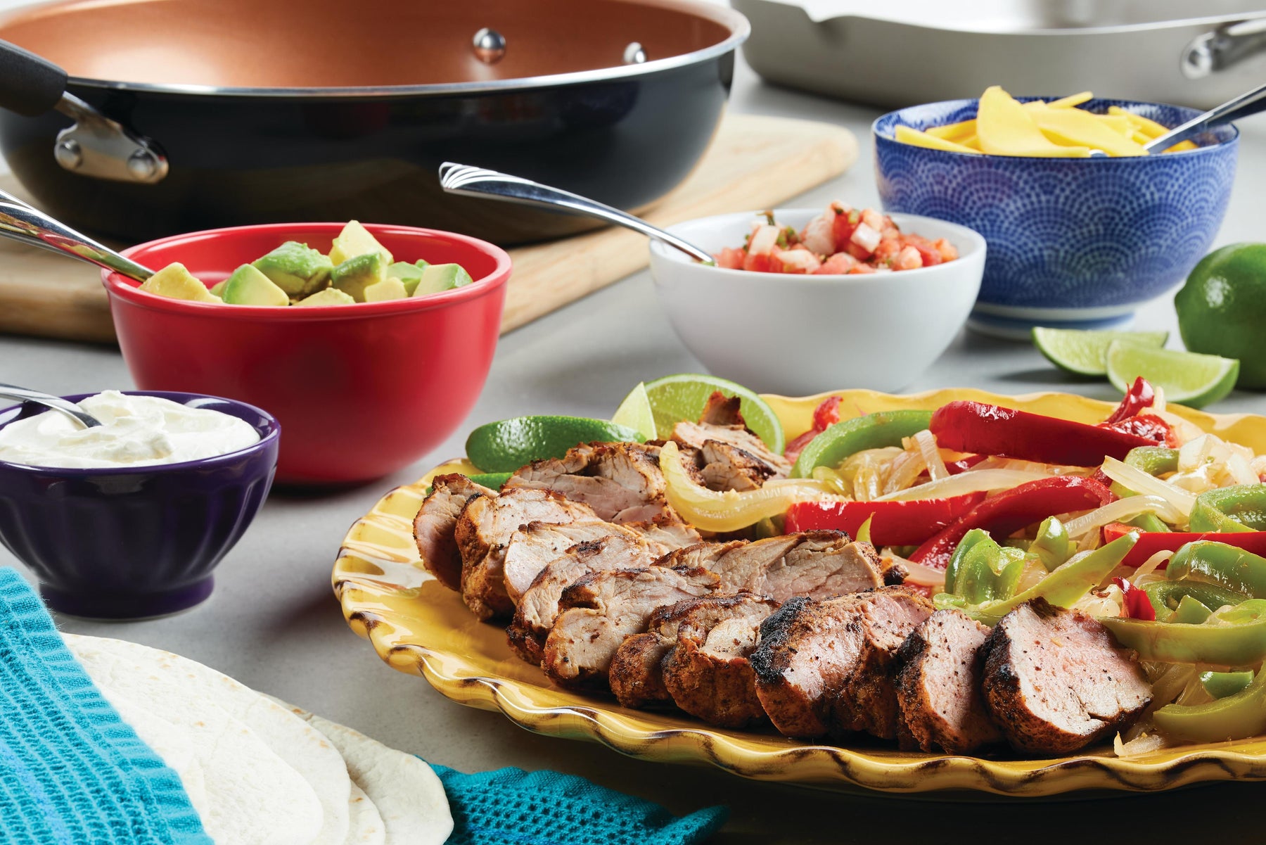 Pork Fajitas with Mango, Peppers, & Onions