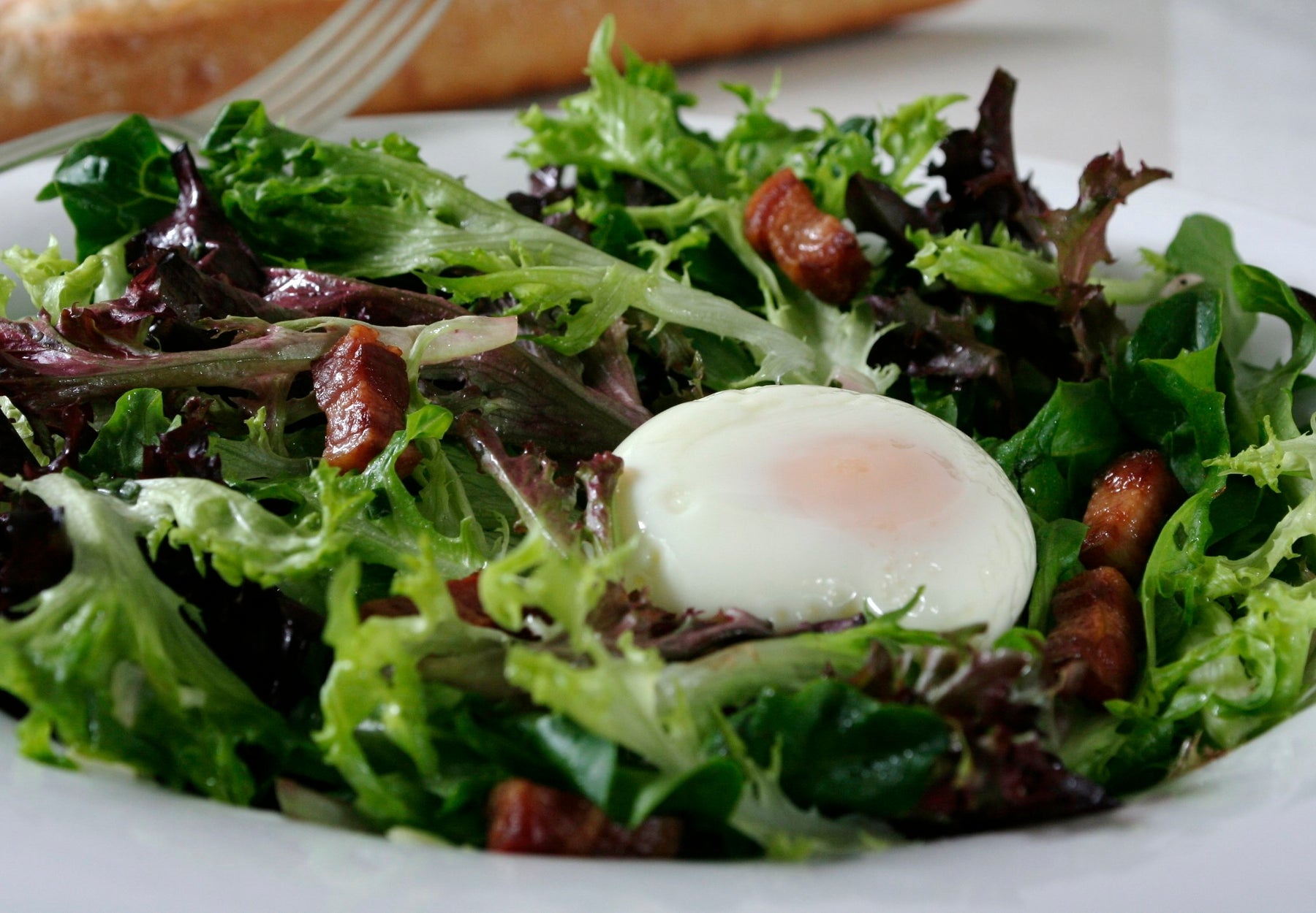 Bistro Salad with Poached Egg and Shallot-Chive Vinaigrette