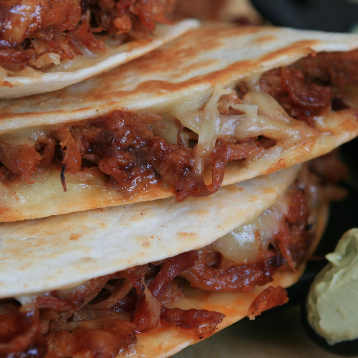 Pulled Pork Quesadilla with Chipotle-Cola BBQ Sauce and Avocado Cream