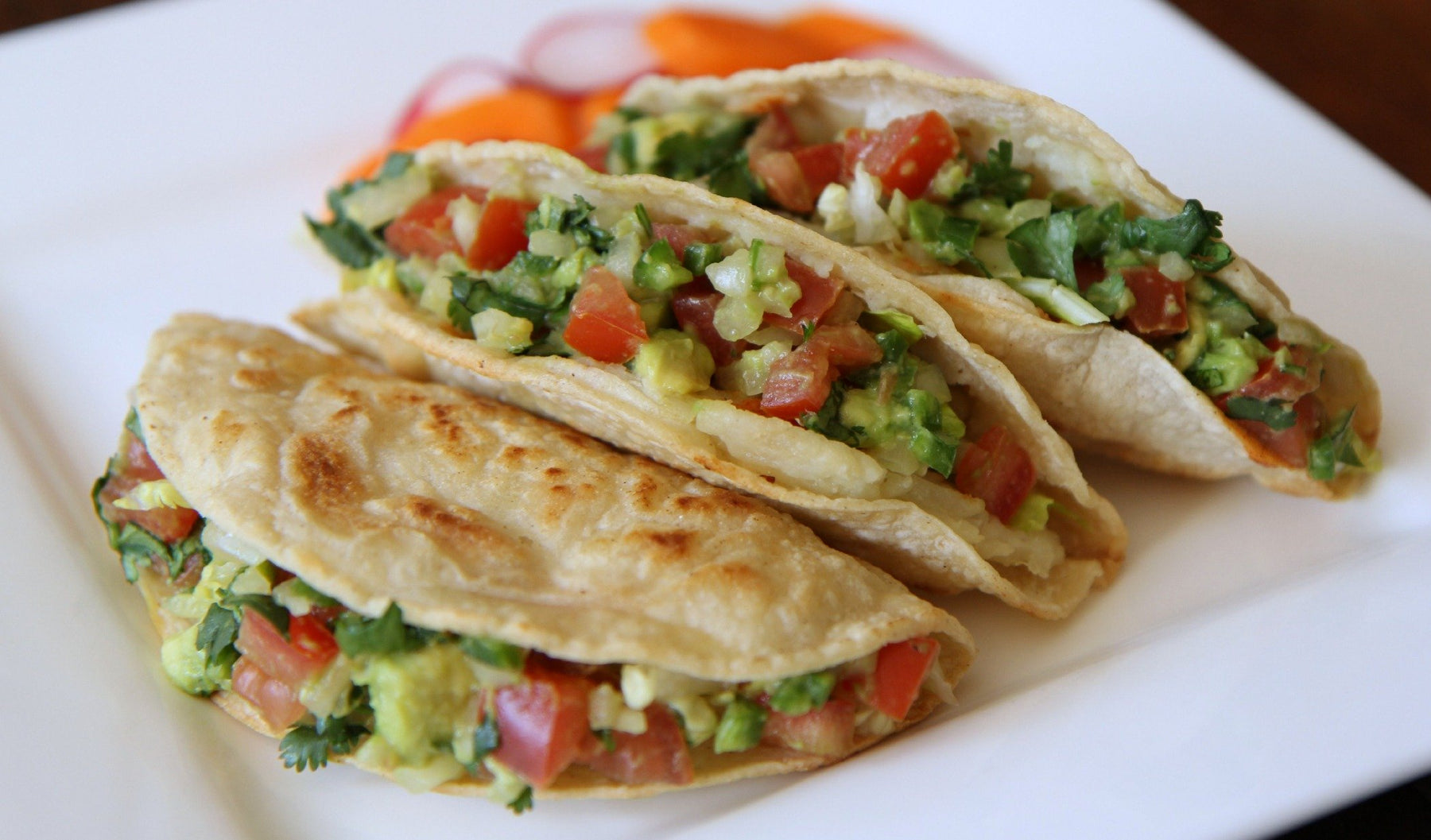 Potato Tacos with Caramelized Onions and Avocado Relish