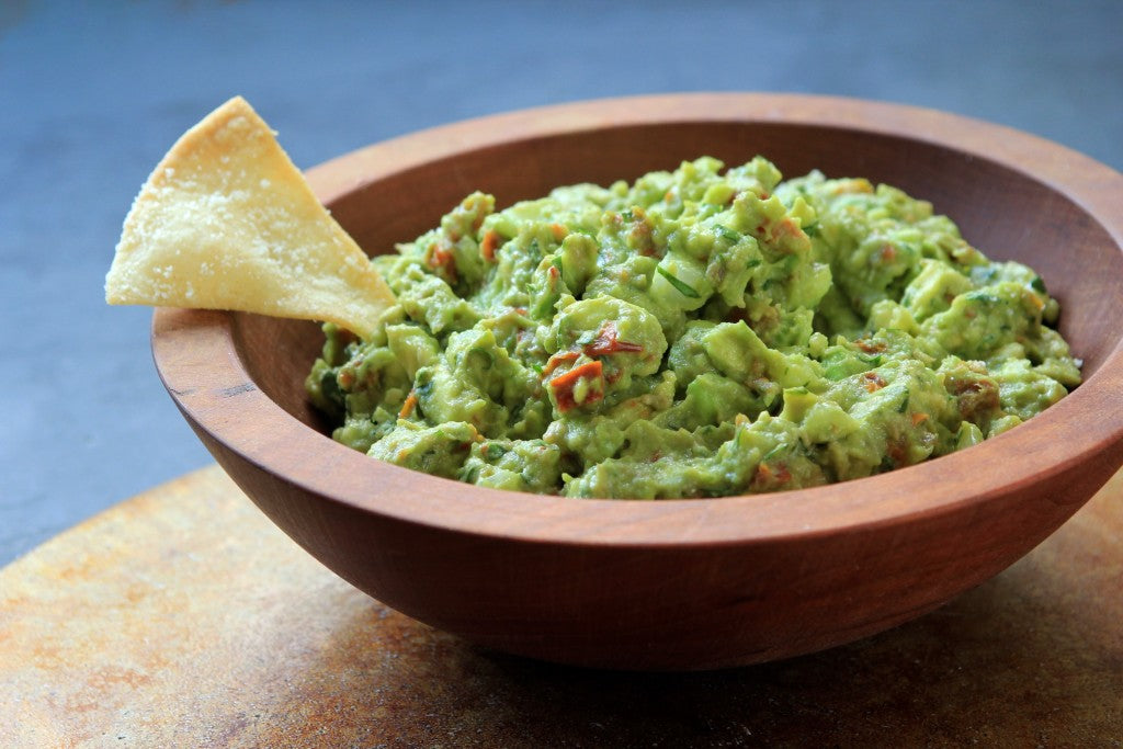 Basil and Sun-Dried Tomato Guacamole with Parmesan Tortilla Chips