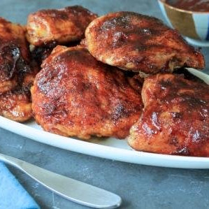 Roasted Chicken Thighs with Raspberry-Passion Barbecue Sauce