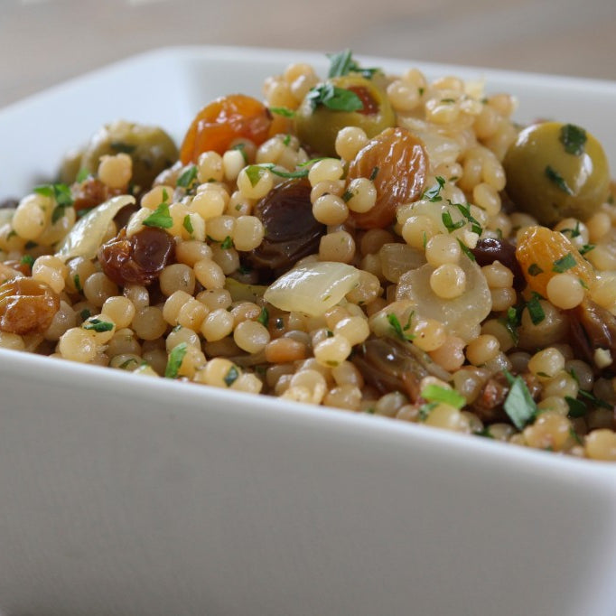 Toasted Israeli Couscous with Olives and Golden Raisins