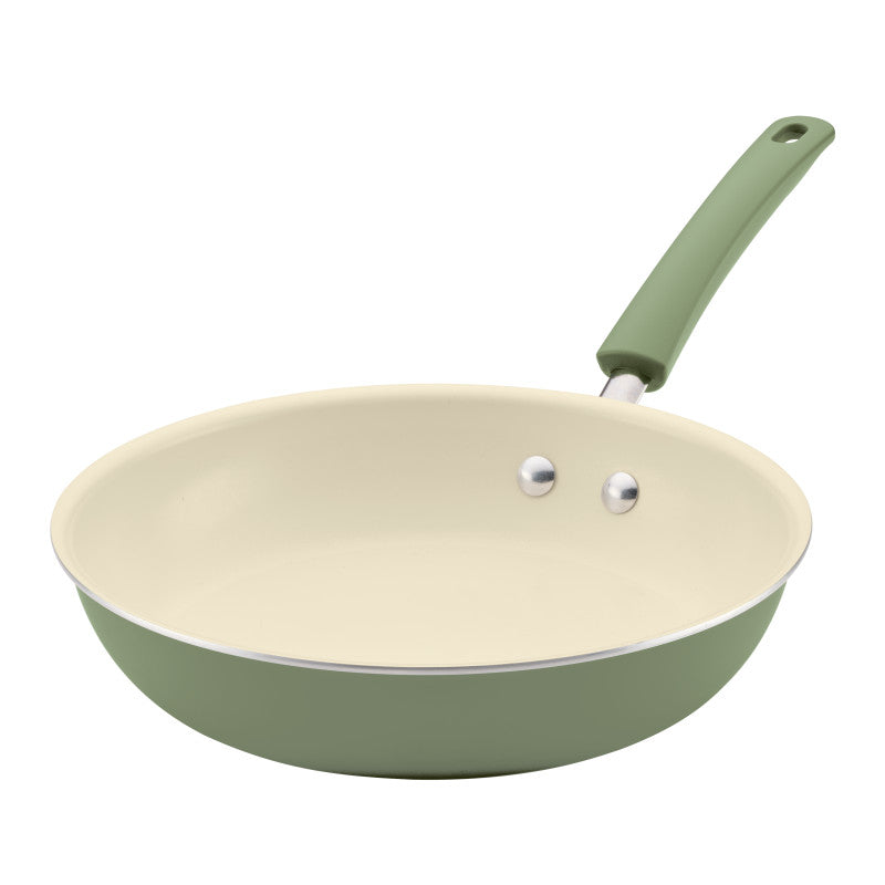10-Inch Ceramic Nonstick Frying Pan with green handle and cream interior.