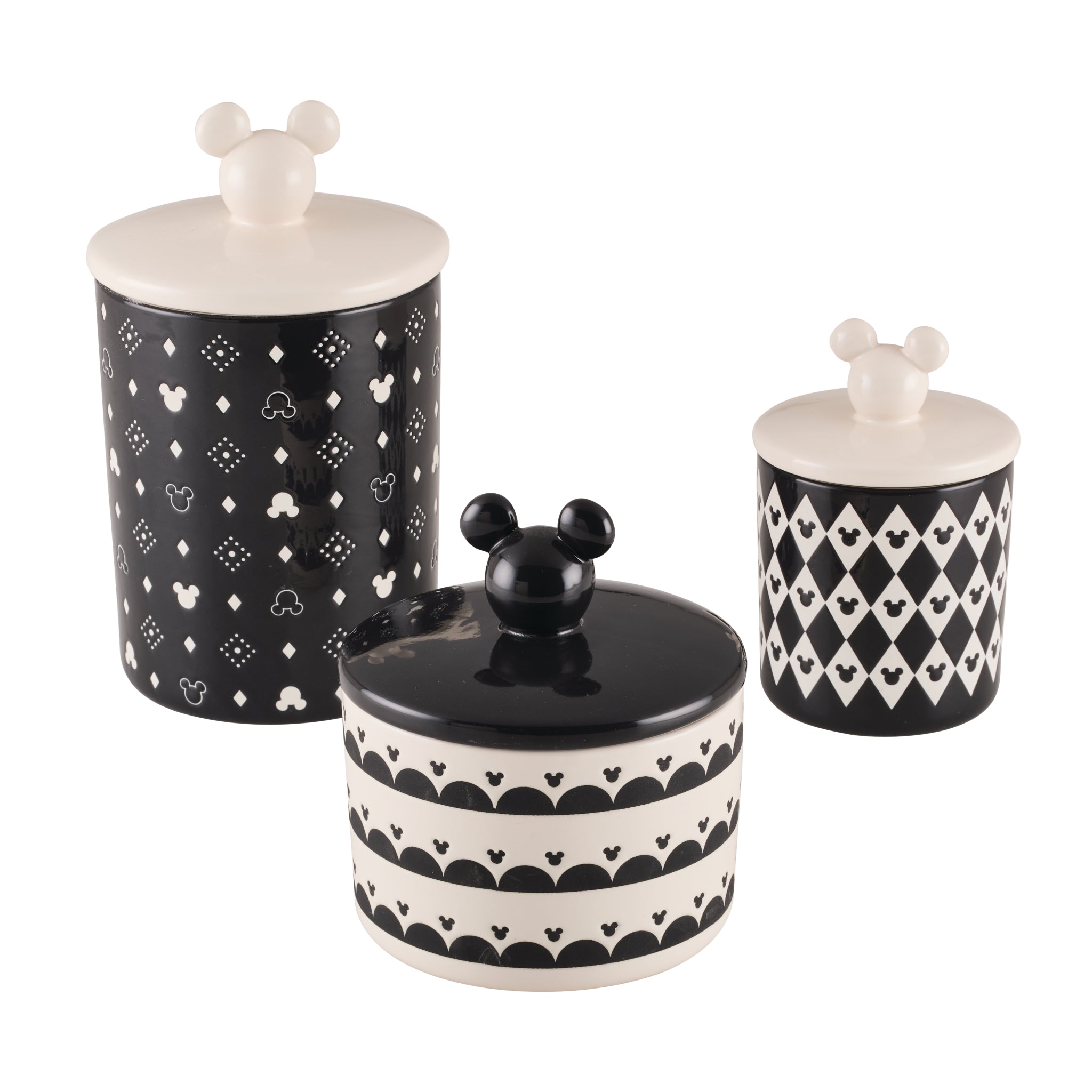 Introducing the 3 Piece Set of Ceramic Jars with Airtight Lids, each featuring whimsical Mickey Mouse ears atop their lids and showcasing an elegant black and white design. Ideal for Disney Mickey Mouse fans eager to sprinkle some enchantment in their kitchen.