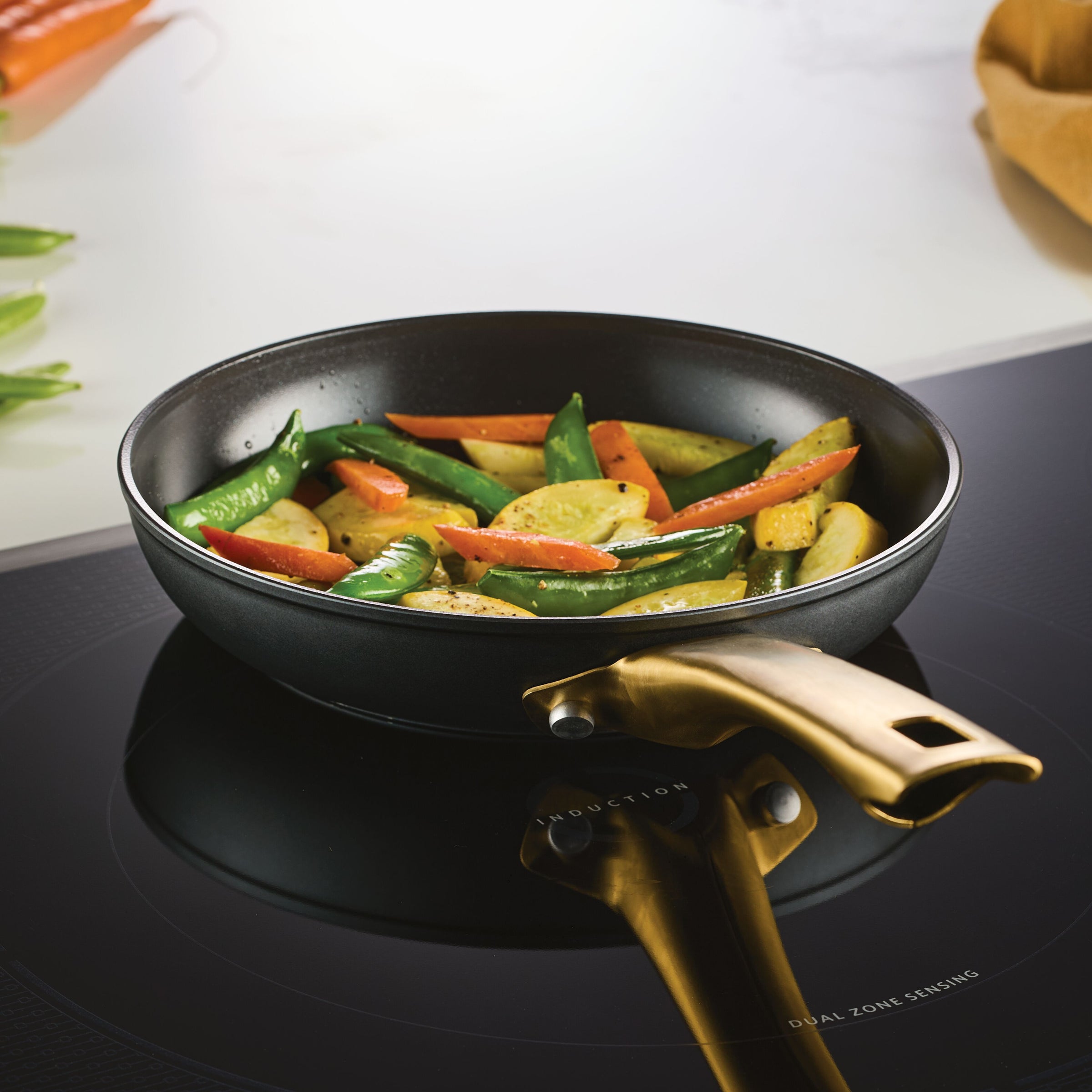 Using the Forged Induction Ceramic 8.25-Inch Frying Pan makes pan frying vegetables on an induction-ready cooktop effortless with its ceramic nonstick surface.
