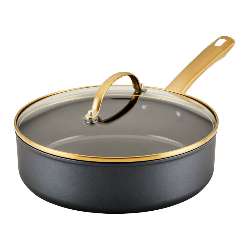Forged Induction 3-Quart Saute Pan with glass lid and gold handle.