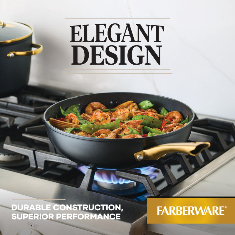 A 12.25-Inch Stir-Fry Pan with Helper Handle on a gas stove cooking food.