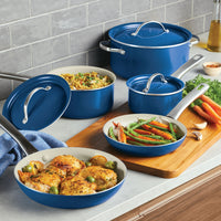 The 12 Piece Ceramic Nonstick Cookware Set, in a sleek blue finish, adorns the kitchen countertop with its perfectly nonstick and dishwasher-safe pots and pans, each showcasing tantalizing dishes.