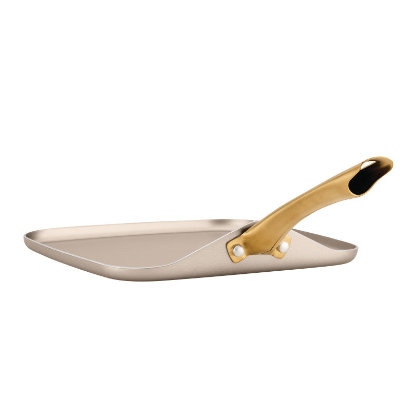 11-Inch Square Griddle Pan, Champagne, with gold handle and even heat.