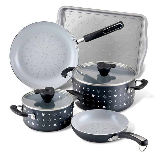 Introducing the 7-Piece Monochrome Ceramic Nonstick Cookware Set, which includes stylish black and white pots, pans, and a baking sheet. Each piece is designed with a ceramic nonstick interior for effortless cooking and easy cleaning, perfectly combining style with function in your kitchen.