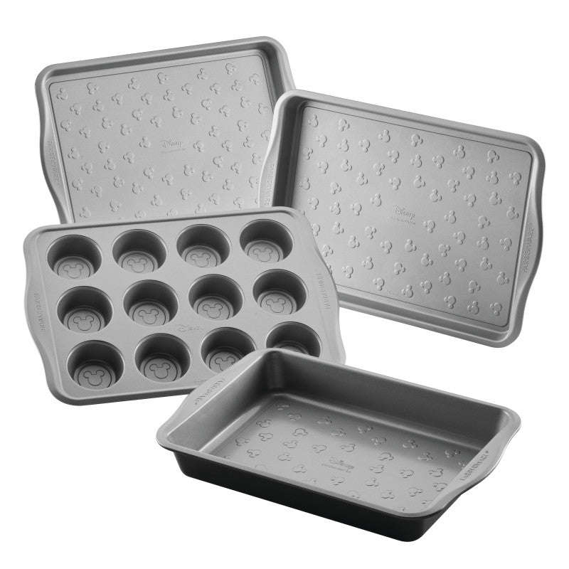 4-Piece Cake, Muffin, and Cookie Pan Set includes nonstick sheets and tray.