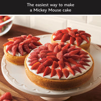 Three Mickey Mouse cakes made with the 6-Piece Bakeware Set on a stand.