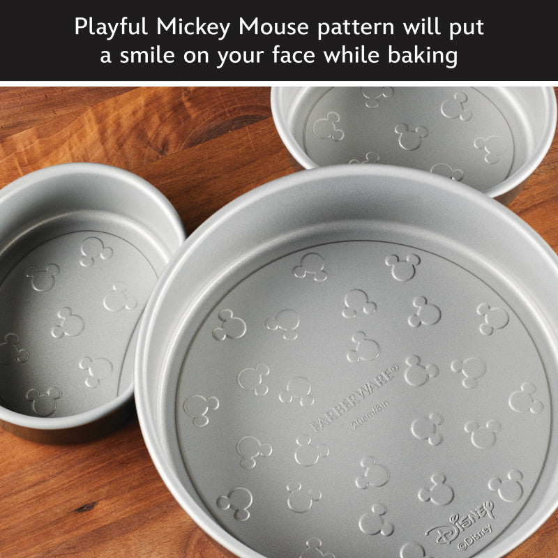 6-piece bakeware set with round pans featuring Mickey Mouse head patterns.