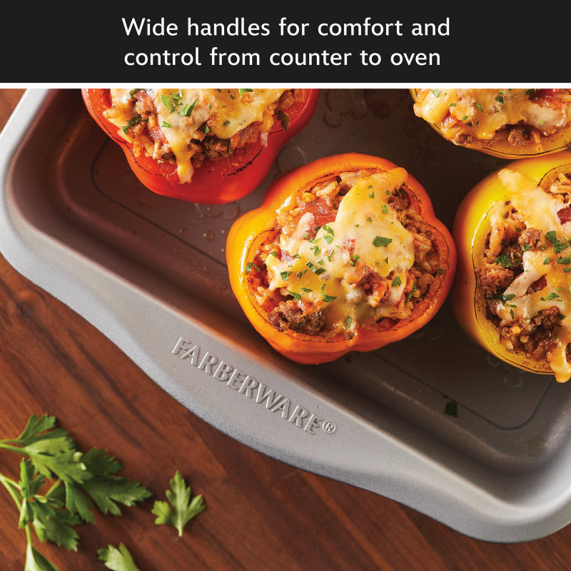 Stuffed bell peppers with melted cheese on a 6-Piece Bakeware Set tray.