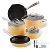The Style Nonstick Cookware Set, 10-Piece in yellow, showcases DiamondMax™ Nonstick technology and includes lids and two kitchen tools.