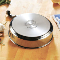 Classic Series 2.75-Quart Saute Pan upside down on a wooden kitchen counter.