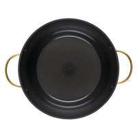 Viewed from above, the Forged Induction Ceramic 6-Quart Stockpot With Lid features a black round design with gold handles and is crafted from forged aluminum.