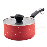 Bon Voyage 2-Quart Ceramic Nonstick Saucepan with Lid, featuring a glass lid and star pattern, ideal for your culinary nautical adventures.