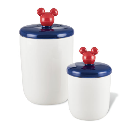 From the Bon Voyage 2-Piece Ceramic Jar Set, these jars feature blue lids with whimsical red Disney Mickey Mouse-shaped handles.