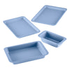 A white background showcases the 4-Piece Nonstick Bakeware Set, featuring four light blue pans in various shapes and sizes, all crafted from heavy-duty steel to ensure durability and reliability for every baking task.