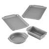 The 4-Piece Nonstick Bakeware Set, featuring silver pans in a variety of shapes and sizes, guarantees easy cleanup after crafting your culinary creations.