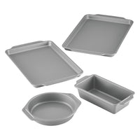 The 4-Piece Nonstick Bakeware Set, featuring silver pans in a variety of shapes and sizes, guarantees easy cleanup after crafting your culinary creations.