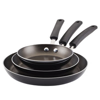 The 3-Piece Nonstick Frying Pan Set, crafted from heavy-duty aluminum with sleek black handles, highlights the exceptional performance of its DiamondMax™ nonstick coating.