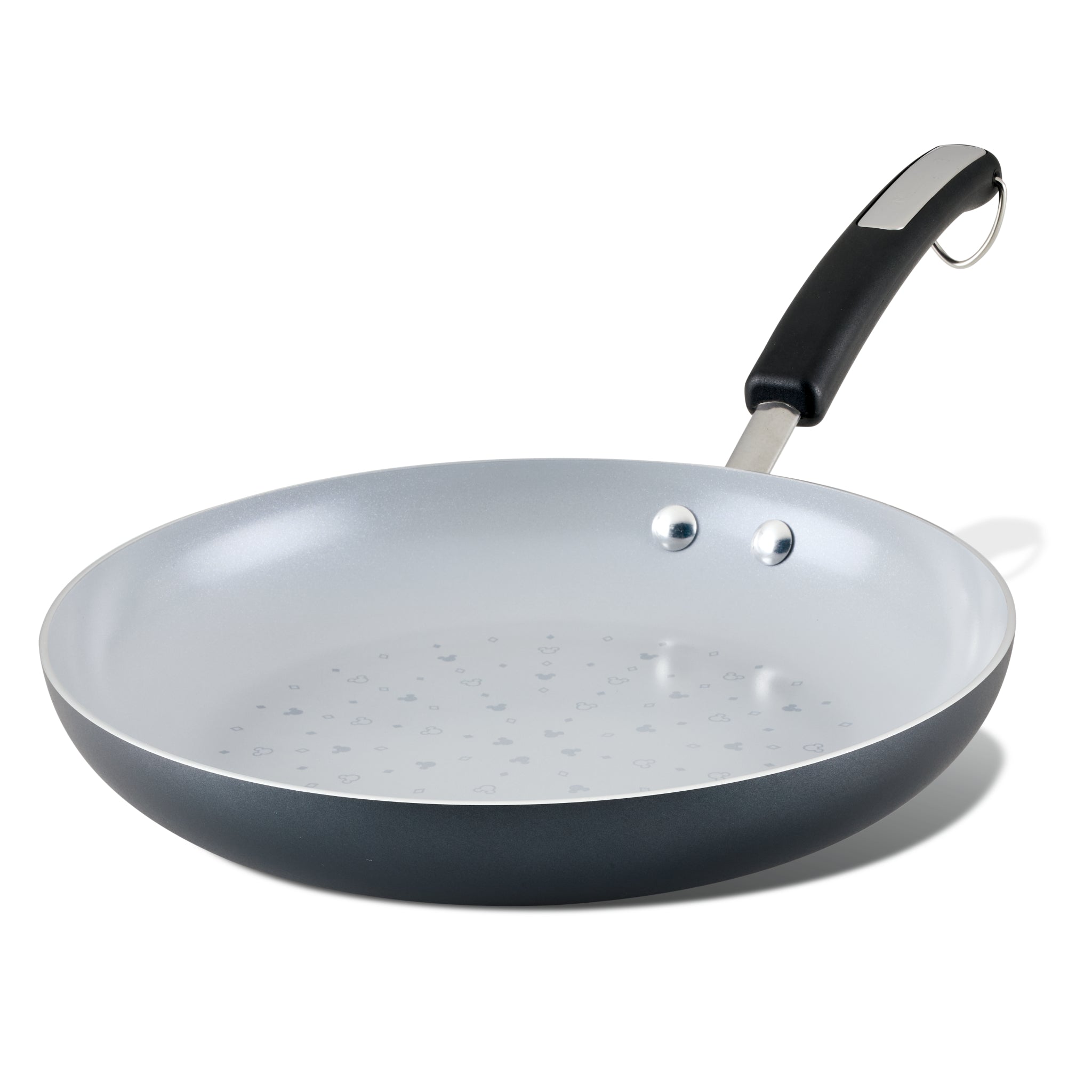 The Monochrome Ceramic Nonstick Frying Pan features a sleek black handle beautifully contrasting with its clean white design.