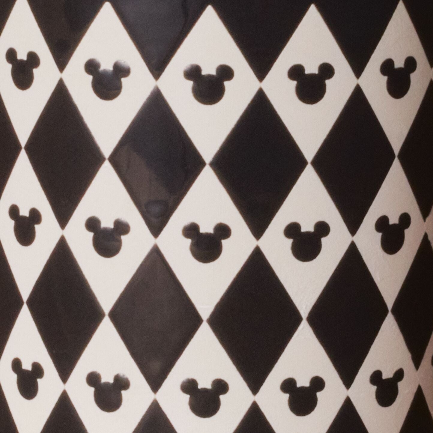 The 3 Piece Set of Ceramic Jars with Airtight Lids showcases a black and white diamond pattern, accented by playful Disney Mickey Mouse ear silhouettes.
