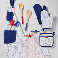 Explore the Bon Voyage collection, which includes a delightful set of kitchen accessories featuring an apron, utensils, oven mitts, and charming Disney Mickey Mouse Bon Voyage Kitchen Towels.