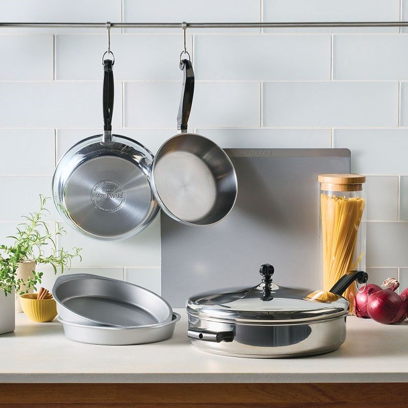 7-Piece Stainless Steel Anniversary Bundle on a kitchen counter.