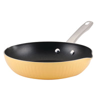 Style frying pan with a vibrant yellow exterior, featuring a black DiamondMax™ Nonstick interior and complemented by a sleek silver handle.