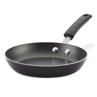 Non-stick frying pan with a black handle on a white background.