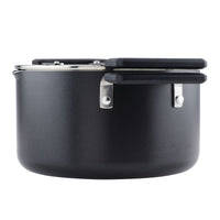 Black cooking pot with a lid and two side handles.