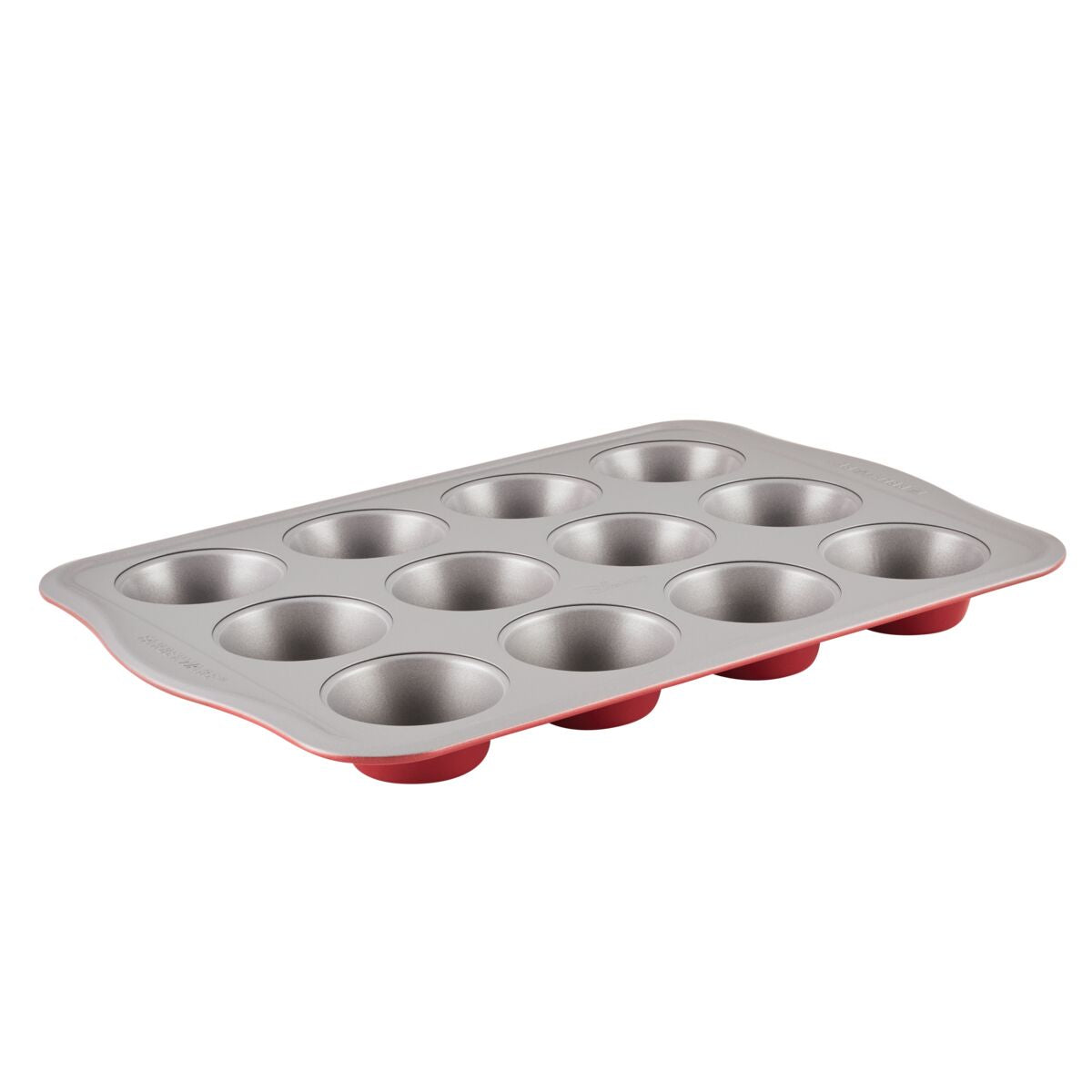 Part of the Bake with Mickey bakeware collection, the 12-Cup Nonstick Muffin Pan showcases vibrant red accents on its sides against a sleek silver backdrop.