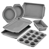 7-Piece Nonstick Bakeware Set: loaf, cake, sheet, and muffin trays.