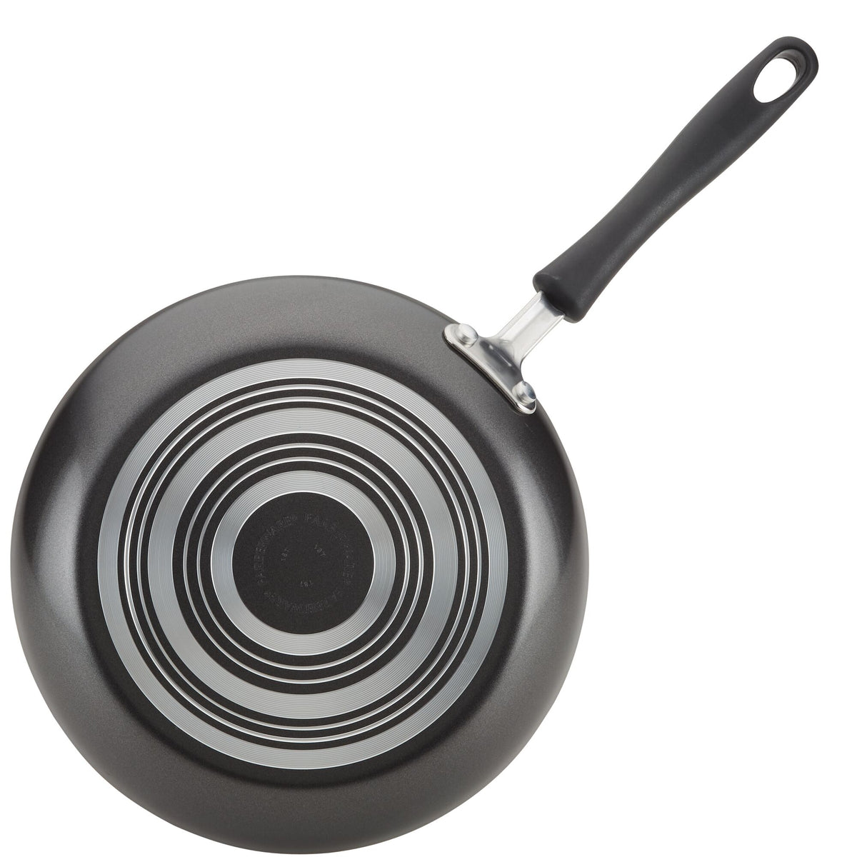 Bottom view of a frying pan with concentric circle design on the base.
