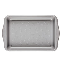 9" x 13" Nonstick Cake Pan featuring a Mickey Mouse pattern on the bottom surface, perfect for adding a touch of magic to your bakeware collection.