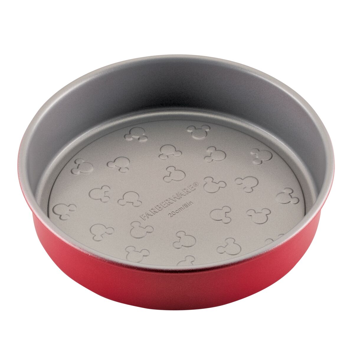 Red round baking pan with embossed design on the bottom.