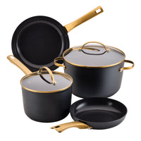 A 6 Piece Cookware Set in black and gold arranged together.