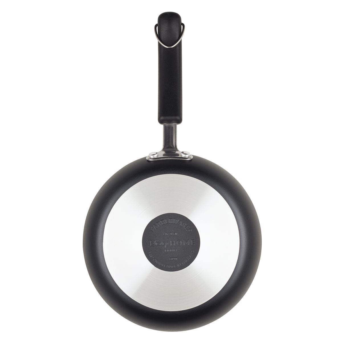 A black frying pan viewed from the bottom side with a visible metal base.