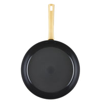 Forged 12.25-Inch frying pan with a gold handle and induction-ready ceramic nonstick surface, viewed from above.