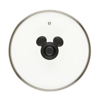 The Bon Voyage 5.5-Quart Ceramic Nonstick Stockpot with Lid, featuring a glass top adorned with a handle shaped like the silhouette of Mickey Mouse's head, adds playful vibrancy to any kitchen and perfectly complements ceramic nonstick cookware.