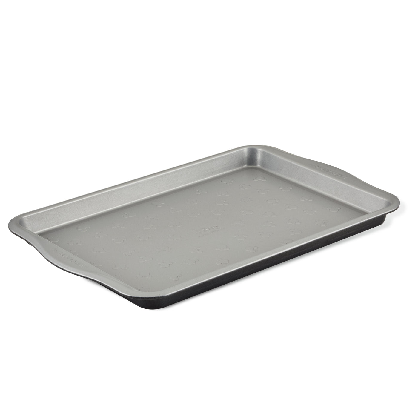 This 10" x 15" Nonstick Cookie Pan, featuring raised edges and designed to meet all your bakeware needs, is set against a white background.