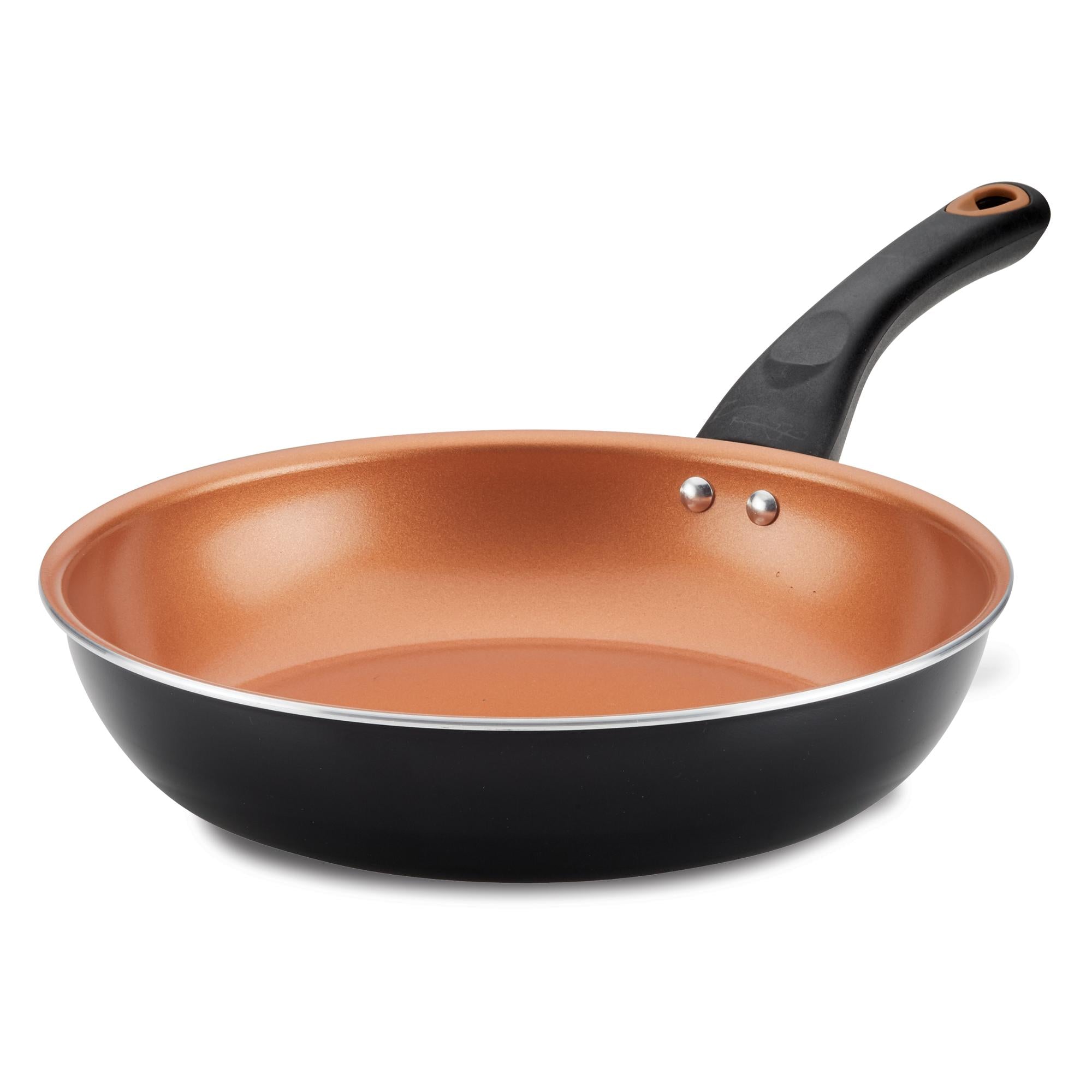 The 10-Inch Copper Ceramic Nonstick Frying Pan boasts a copper-colored interior with CopperSlide technology for seamless nonstick food release and comes with a stylish black handle, making it dishwasher safe for easy cleaning.
