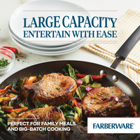A 14-Inch Nonstick Frying Pan with Helper Handle, featuring cooked pork chops and vegetables, elegantly sits on the table, highlighting its dishwasher-safe convenience for effortless cleanup.