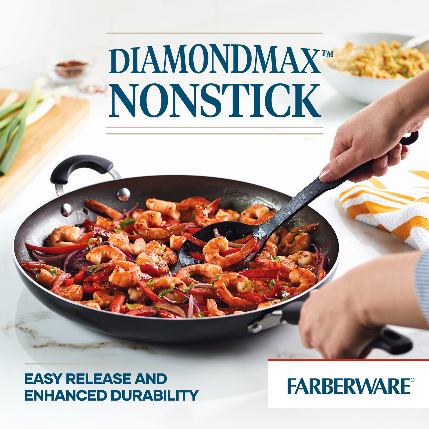 A person is cooking shrimp and vegetables in a 14-Inch Nonstick Frying Pan with Helper Handle, enjoying the convenience of a Farberware design that's also dishwasher-safe for quick cleanup.
