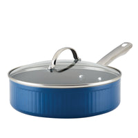 Introducing the elegant Style Nonstick Cookware Saute Pan with Lid, 3-Quart: a beautifully designed blue sauté pan with a glass lid and metal handle, crafted with DiamondMax™ Nonstick technology for outstanding nonstick performance.
