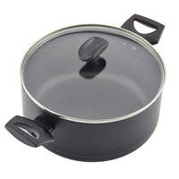 Ultra-durable black cooking pot from the Power Base 12-Piece Cookware Set, featuring a nonstick surface, a glass lid, and sleek black handles.